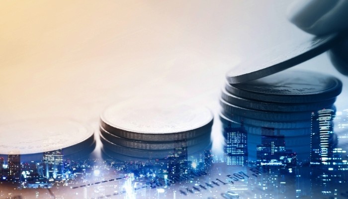 Double Exposure Of City And Rows Of Coins For Finance And Banking Concept 2