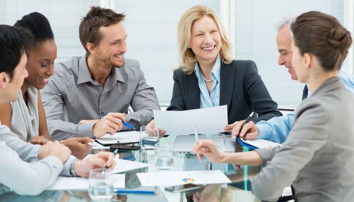 Smiling group of business people in a meeting