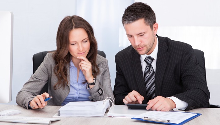 An accountant helping his client