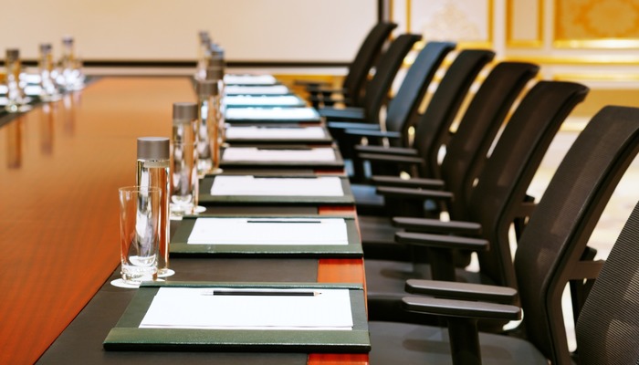 Interior of a corporate boardroom prior to a meeting
