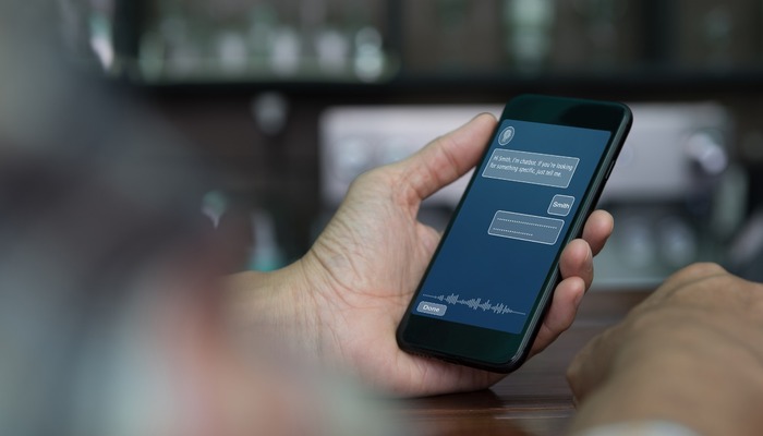 Man using chatbot on smartphone