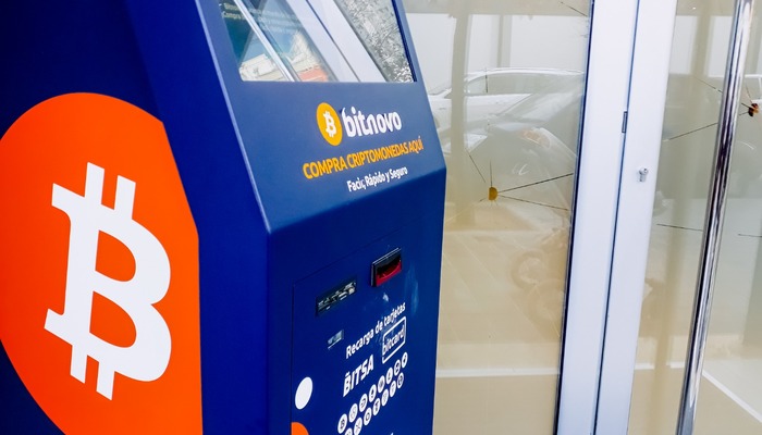 Automatic bitcoin ATM vending machine placed on the street for public use.