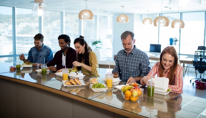 Creative business team having meal
