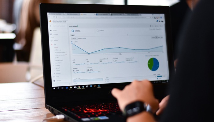 Man using Google Analytics on his laptop