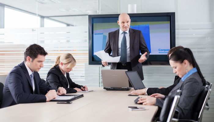 Boss in a bad mood because of bad results, telling his employees