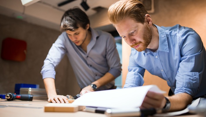 Business partners looking over their plans